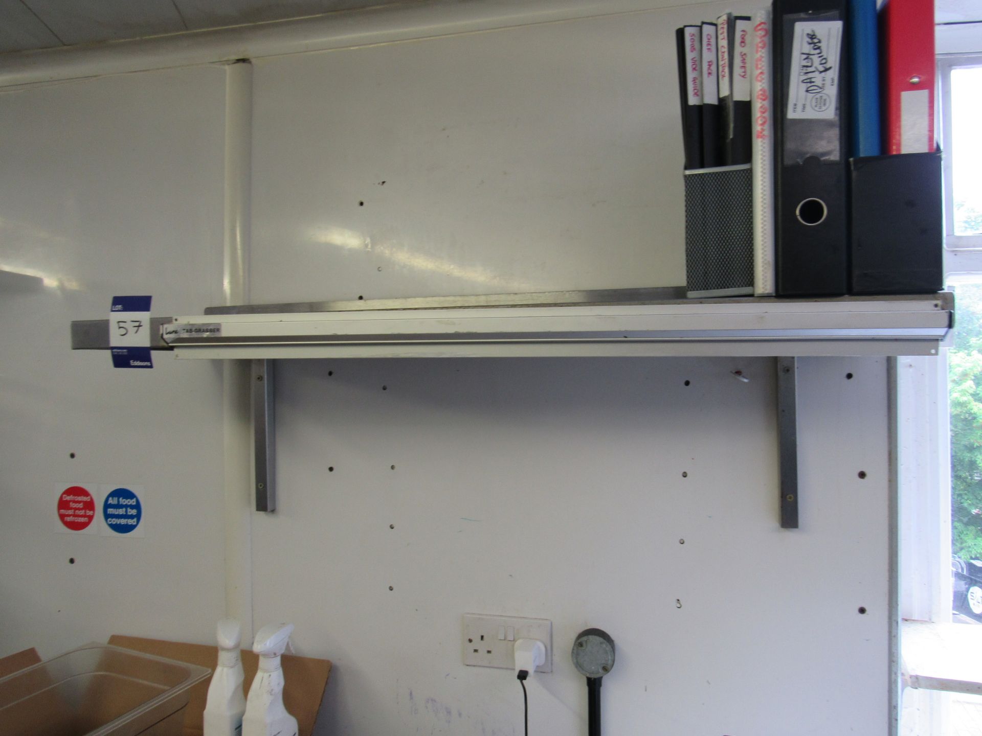 Stainless steel wall mounted shelf unit