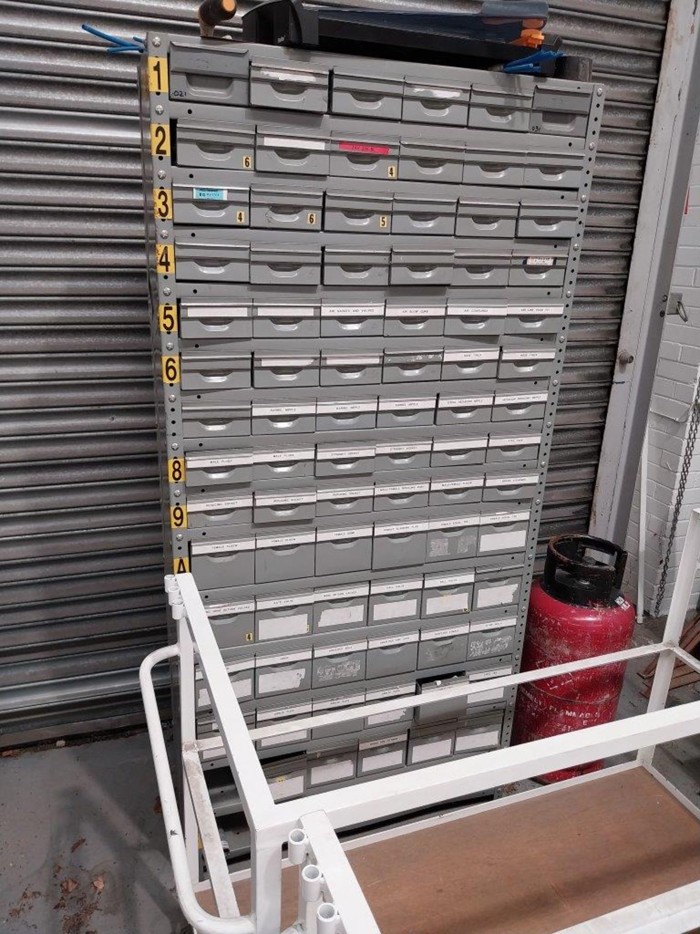 Storage rack with individual drawers