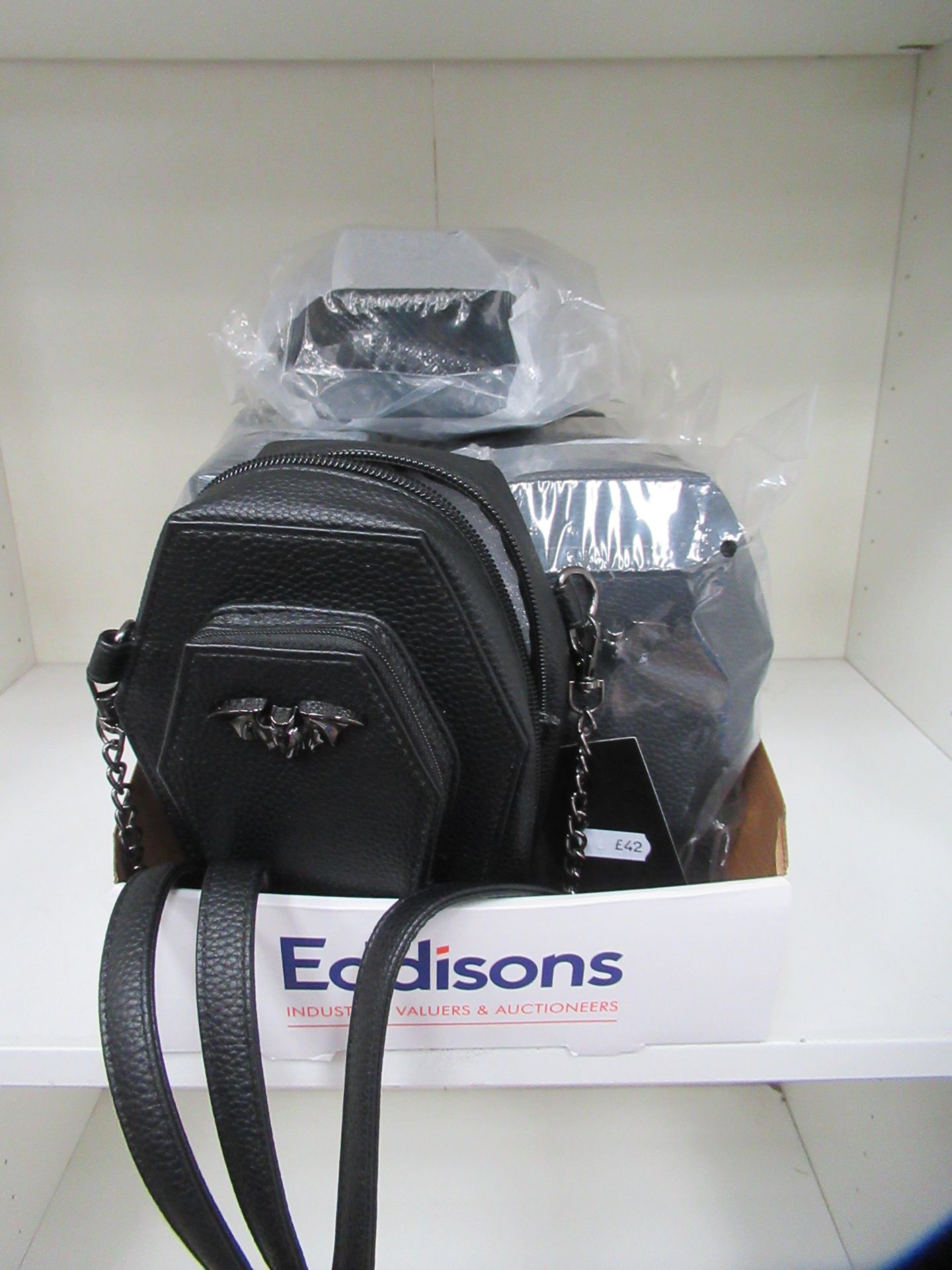 Box of 7x faux leather bat/coffin crossbody Bags