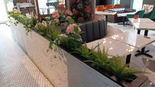 Quantity of artificial potted plants to dining area