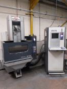 ONA electric erosion model AE300 wire cutting EDM machine with control unit submerged and