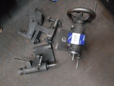 Camming device for cutter grinder