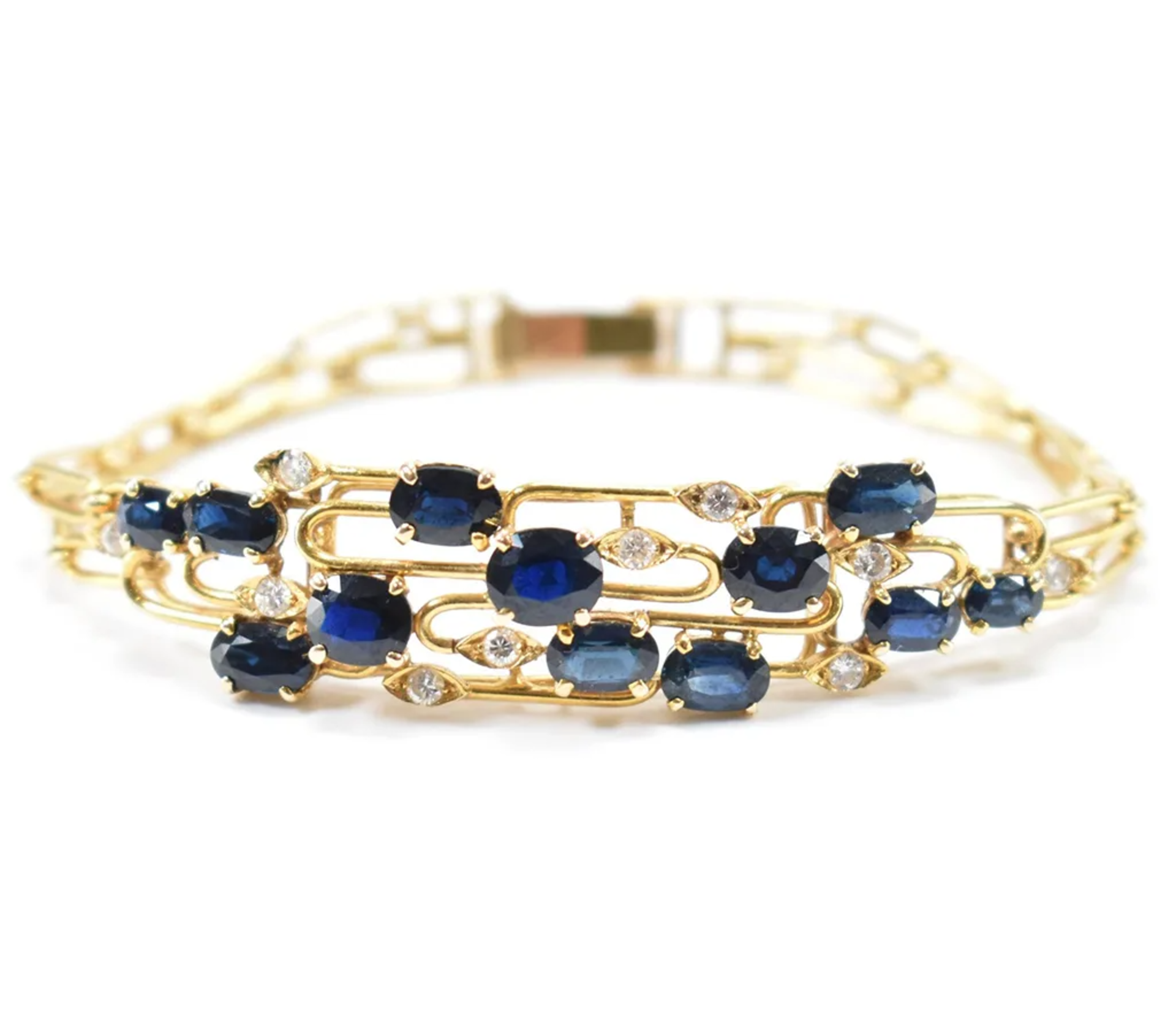 Armband mit 12x blauen Saphiren und Diamanten 585 Gelbgold