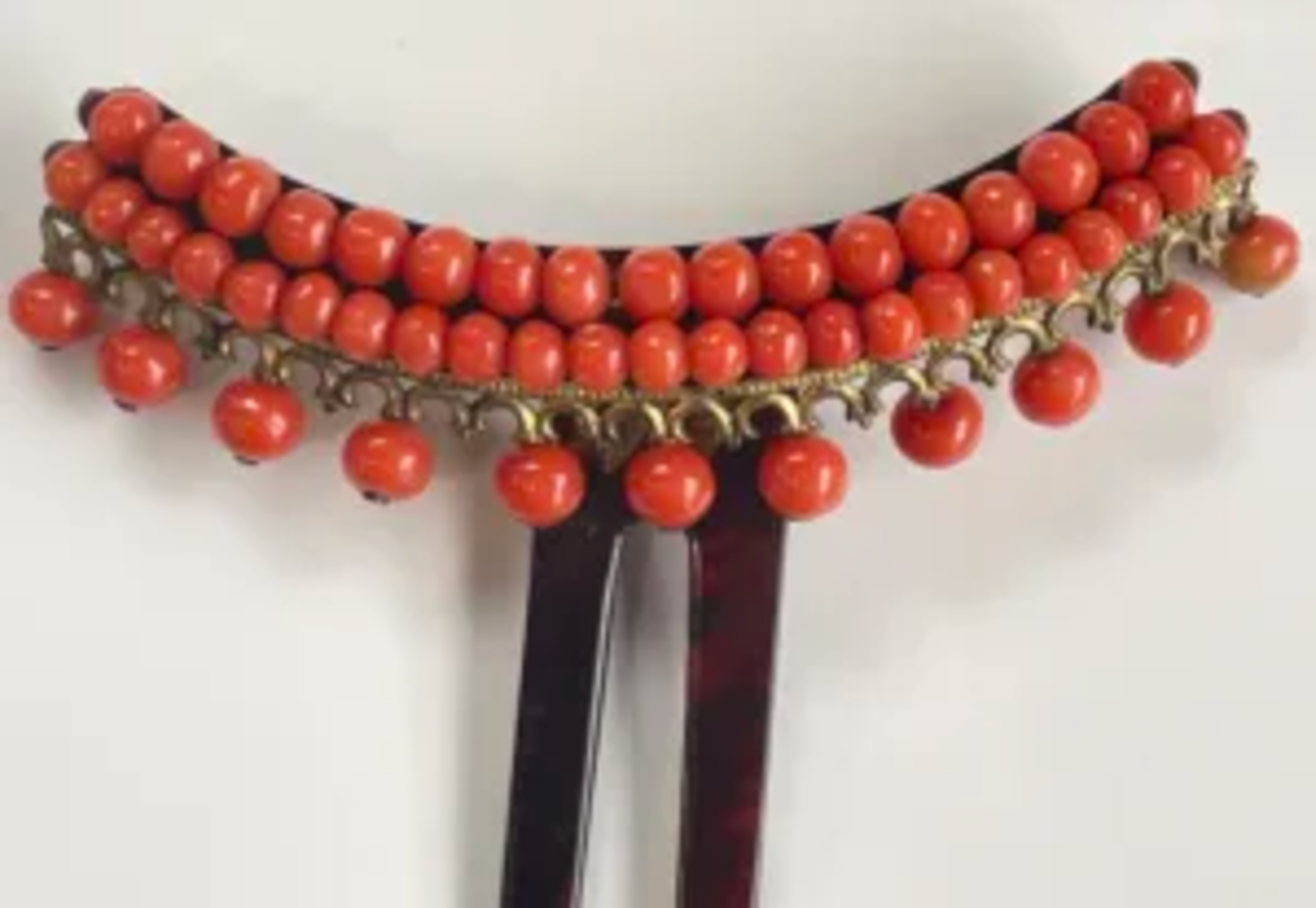 Antique coral hair comb