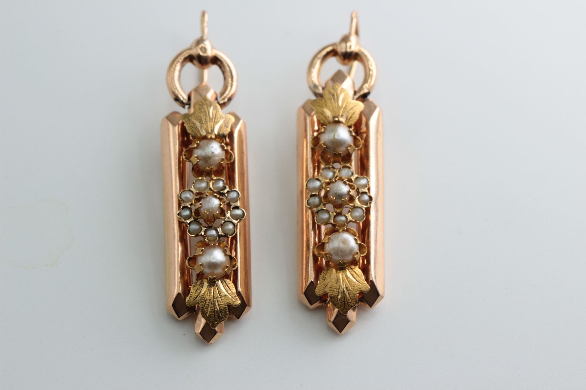 Antique earrings with seed pearls