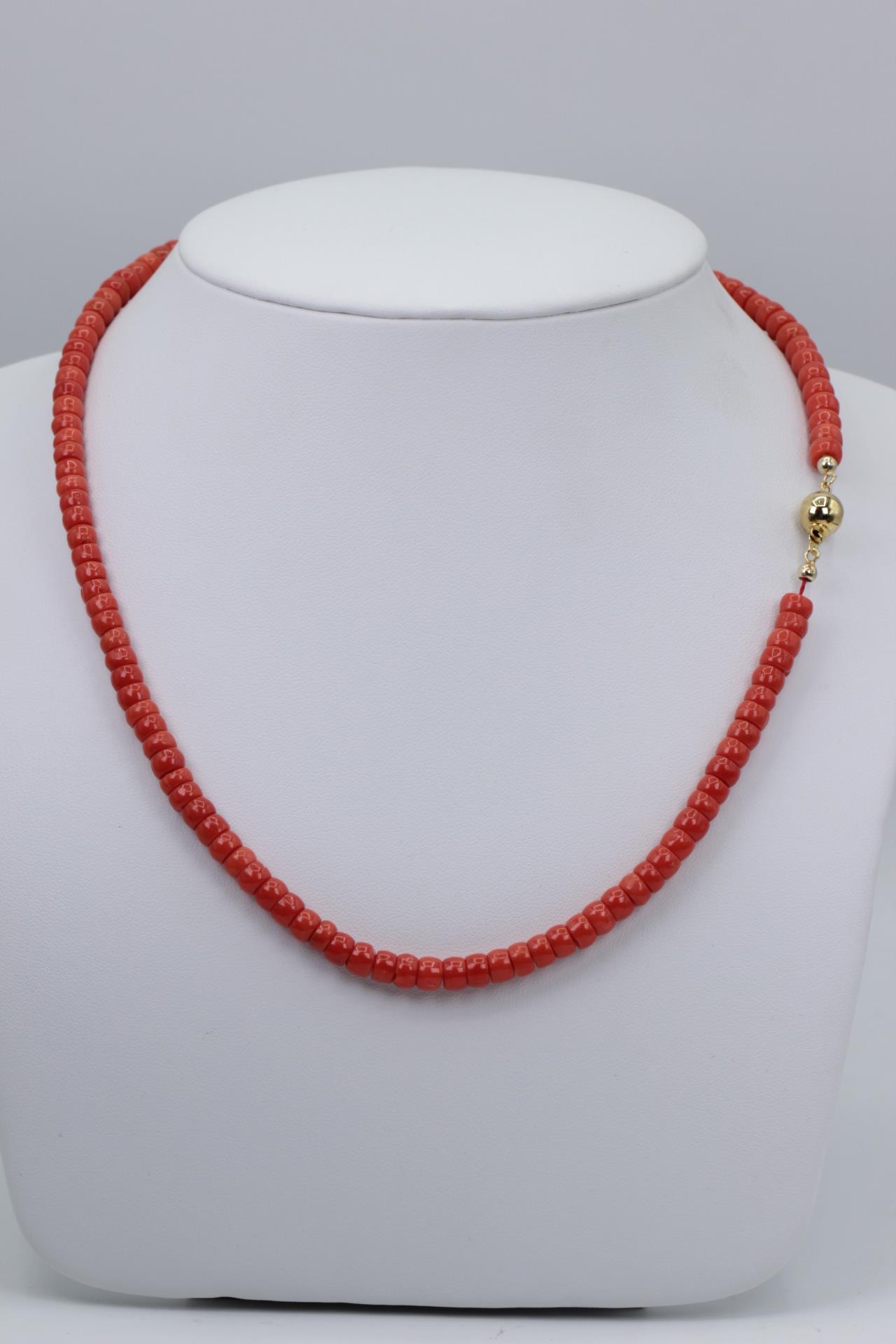 Coral necklace with gold ball clasp