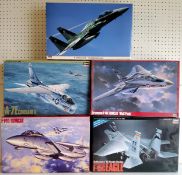 Five boxed Hasegawa 1/48 scale aircraft kits; 09832 F-15DJ, 3800 F-15c Eagle, 07020 Grumman F-14A