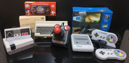 A Flashback The C64 Mini home computer with joystock, no.RGL001; a Flashback Nintendo Classic Mini