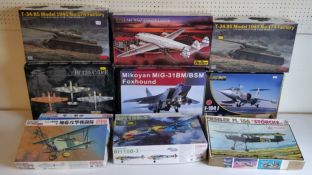 Ten boxed aircraft and tank model kits; #R0005 Royal Class Bf110, #88003 AMK Mikoyan MiG-31BM, #