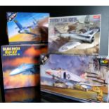 Four boxed 1/48 scale Academy Hobby Model Kits; #2131 Sukhoi SU-27, #12232 F-4B, #12234 U.S Air