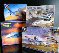 Four boxed 1/48 scale Academy Hobby Model Kits; #2131 Sukhoi SU-27, #12232 F-4B, #12234 U.S Air