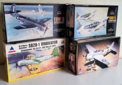 Four boxed Accurate Miniatures aircraft model kits; #480200 SB2U-1 Vindicator, #3404 TBM-3, #3403
