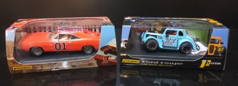 A Pioneer slot car no. P131 General Lee, Dodge Charger,  complete with Bo, Luke & Daisy Duke