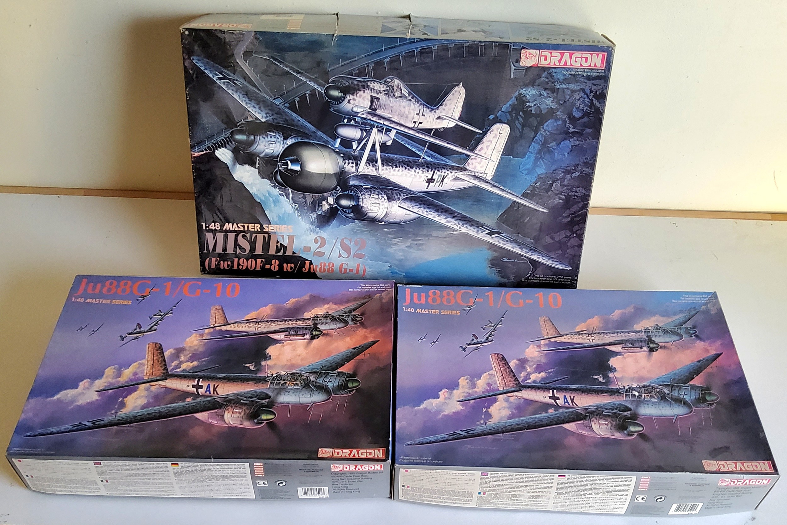 Three boxed Dragon German Luftwaffe aircraft model kits; #5510 Mistel-2/s2, #5521 Ju88G-1/G-10