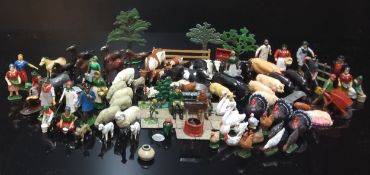 Britains farmyard figures and animals including milkmaids, shepherds, tractor drivers, pigs,