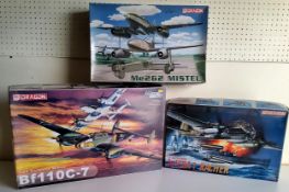 A boxed #3203 Dragon 1/32 Bf110C-7 aircraft kit; #5541 Me262 Mistel and #5517 Ju188A-1 Racher, (