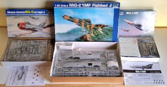 A Boxed Trumpeter 1/32 Scale 02218 MiG-21MF Fishbed J Aircraft kit; a 02806 Mig-15 and 02865 MiG-