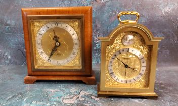 An Elliott walnut mantel clock, silvered dial with Roman numerals, 15cm high;  a brass Swiza