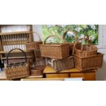 A collection of farmhouse wicker baskets including picnic hamper, wine basket, etc