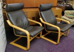 A pair of vintage Ikea Poang rocking armchairs, brown polypropylene upholstery;  another, in