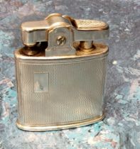 A Sterling Silver Ronson Standard Lighter Brit Pat 821570, the body stamped Sterling Silver