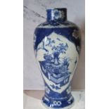 A large 19th century Chinese ovoid vase, decorated in underglaze blue with vase and precious