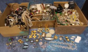 A quantity of costume jewellery including a Monet brooch earrings; another brooch; other brooches,