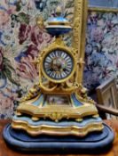 A 19th century French ormolu mantel clock, turquoise Serves type porcelain panels, signed in puce to