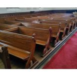 The entirety of the ecclesiatical Victorian Pugin style pitch pine pews, twenty two banks in