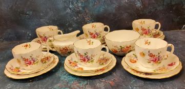 A Royal Crown Derby Posies tea service, for six, comprising teacups, saucers and side plate, printed