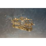 An unusual 9ct gold brooch in the form of the night sky, the seven gold bars in the form clouds