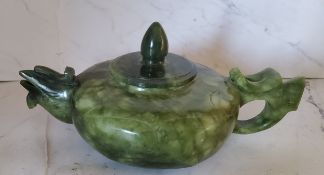 A Chinese Jade teapot and cover,  bird spout,  bud knop, 17m wide