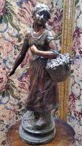 A 19th century French bronzed spelter figure 'Harvest', on plinth base, she stands 52cm high (