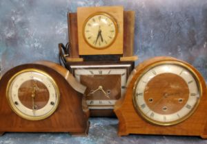 An Art Deco oak mantel clock, twin winding holes, c.1930;  others (4)