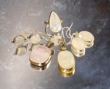 A silver gilt mounted moonstone drop pendant, the oval moonstone surmounted with a collet set