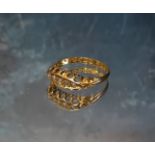 An 18ct gold gypsy ring set with five round diamonds, size O, Chester, 1912, 2.58g gross