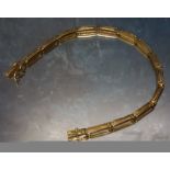 An 18ct gold bracelet, elongated Greek key links, stamped 750, 7.4g