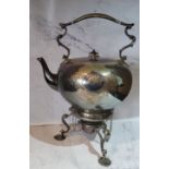 A Victorian E.P.N.S. globular spirit kettle on stand, engraved with circular cartouche and scrolling