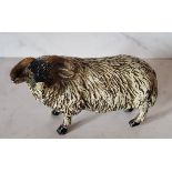 A Bergman cold painted bronze, of a black faced horned ram, 5cm high, monogrammed