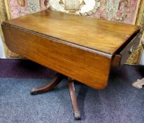 A 19th century mahogany Pembroke table, drawer to frieze, blind to verso, rounded rectangular top,