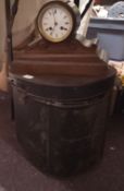 A 19th century black painted tin hat box;   a 19th century French mahogany mantel clock, Roman
