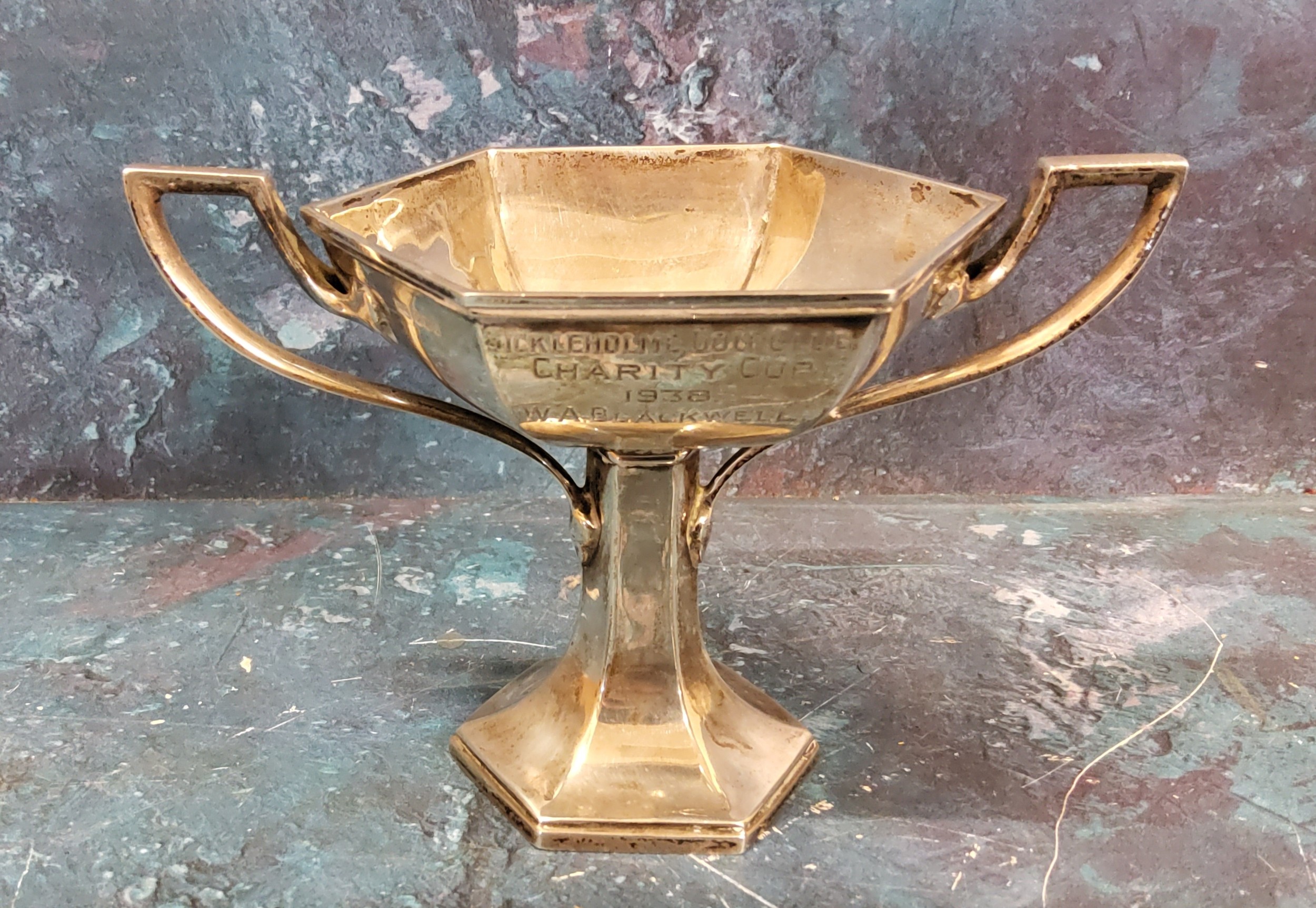 A silver two-handled pedestal hexagonal trophy cup, 9cm high, Sheffield 1937, 128g, 4.12toz;  a - Image 2 of 2