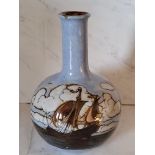 A Royal Doulton bottle vase, tube lined with a continuous scene of galleons at sea, 17cm high,