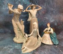 A Lladro figure, of a Golfer, 27cm high;  others;  a Royal Doulton figure, Hurdy Gurdy, HN2796 (4)