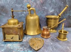 A brass bell, 21cm high;  a brass pedestal pestle and mortar;  another, smaller;  a coffee grinder;