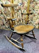 A 20th century spindle back rocking chair