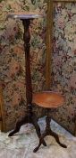 A small Victorian dished top tripod occasional table; a taller reproduction torchere (2)