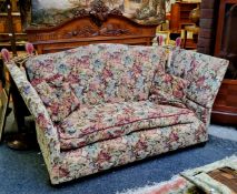 A 'Victotian' Country House knowle sofa, tapestry upholstery, bun feet, castors