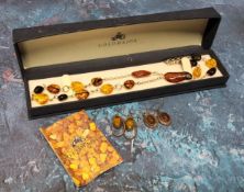 A Goldmajor silver and amber necklace in original box; two pairs of silver & amber earrings