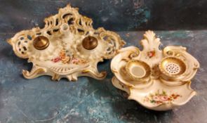 A French Rococo porcelain standish, decorated with colourful flowers, picked out in gilt, 17cm wide,